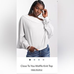 NWOT FREE PEOPLE Close to you waffle knit top Size Small,color is a baby blue .